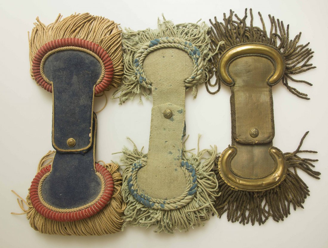 3 Pairs of U.S. Brush Epaulets: 2 Infantry Officer’s: 1. Gold colored, probably Mexican-American War period U.S. Infantry Officer’s brush epaulets. Both have eagle with “I” on breast buttons. 2. Light blue wool brush epaulets with eagle buttons wit