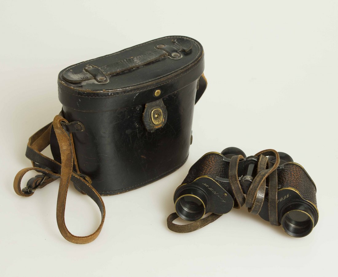 WWII U.S. Navy Binoculars in Case: Made in U.S. Navy Gun Factory, Rochester, N.Y. 1942. Name on frame: K.A. Molitor. Also marked “Military Stereo 6X30” Barrels have pig skin covering. Engraved “US Navy” and “17695.” Please 
