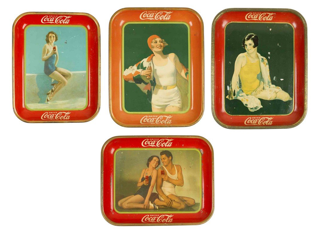 Coca-Cola Trays: 1929, 1930, 1933 & 1934: Coca-Cola Trays: 1929, 1930, 1933 & 1934. The 1929 Tray is unusual in that it was made by "TINDECO" the Tin Decorating Company of Baltimore. The other three trays were made by "American Art Works, Inc