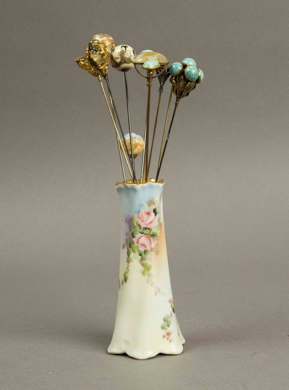 Victorian Hatpins with Mostly Turquoise Stones: Victorian Hatpins with Mostly Turquoise Stones. Approximately 11 hatpins with colored stones, painted ceramic tops (2 to 3 examples) and gold filigree in a porcelain holder. Processing and shipping w