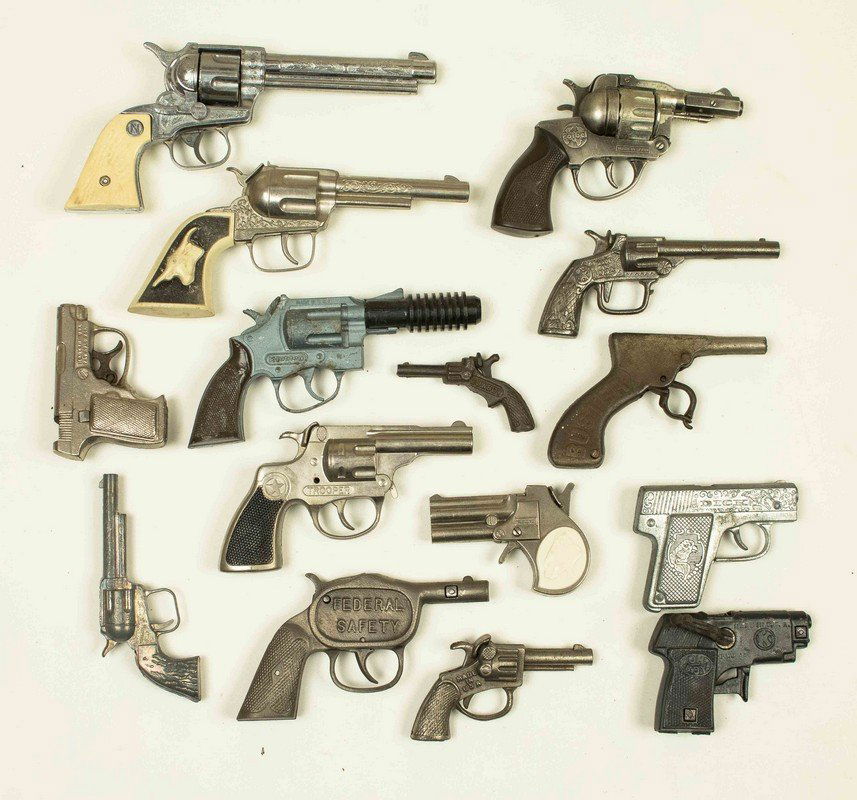 15 Assorted Cap Guns: 15 Assorted Cap Guns, in both cast iron and pot metal. Cap guns include early Stevens "Cowboy", Kilgore Rapid Firing "OH BOY" and "Buster", "Pat'd July 2, 1907". Processing and shipping