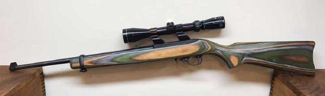 Ruger, Custom 10/22 with Scope and 4 mags: Make: Ruger | Type: Rifle, Semi-Automatic | Model: 22 LR | Caliber: 22 LR | # of Magazines: 4 | Grips: Standard | Sights: YES | New or Used: Preowned | Notes: For 50 years, the Ruger 10/22 has been Am