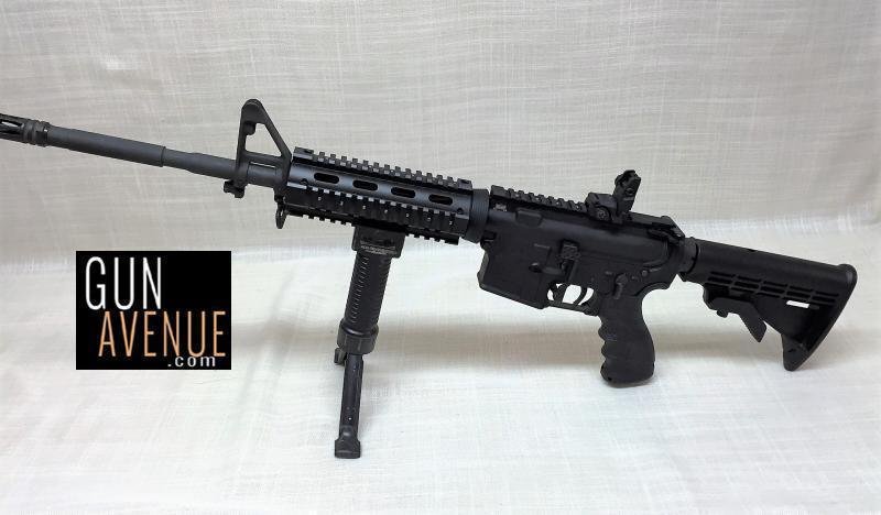 Palmetto PSA 16'' M4 PREMIUM CARBINE with upgrades and: Very nice pre owned AR-15 with added Quad Rail for accessories, Mag Pull rear sight and Grip, bi-pod and extended slide release. Finally a complete rifle ready to go for one low price. Our M4 Carbine 