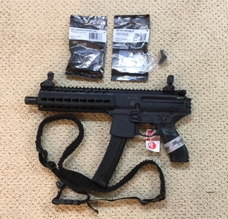 Sig Sauer MPX 9mm, sling, 1 mag and extra's: Manufacturer: SIG SAUER Model: MPX Caliber: 9MM LUGER Barrel Length: 8” Capacity: 30+1 Action: SEMI AUTO Grips: BLACK SYNTHETIC Sights: METAL FLIP UP SIGHTS Weight: 6.1 LBS. OAL: 26.37" Frame Materi