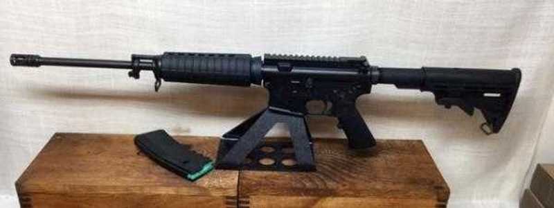 Bushmaster XM15 E2S AR-15 5.56: New Bushmaster Optics Ready Tactical Carbine with all Factory accessories in the original Box. Has 16" M4 barrel, Flat top receiver, low profile gas block, sling, 30 round magazine, manual, etc. This 