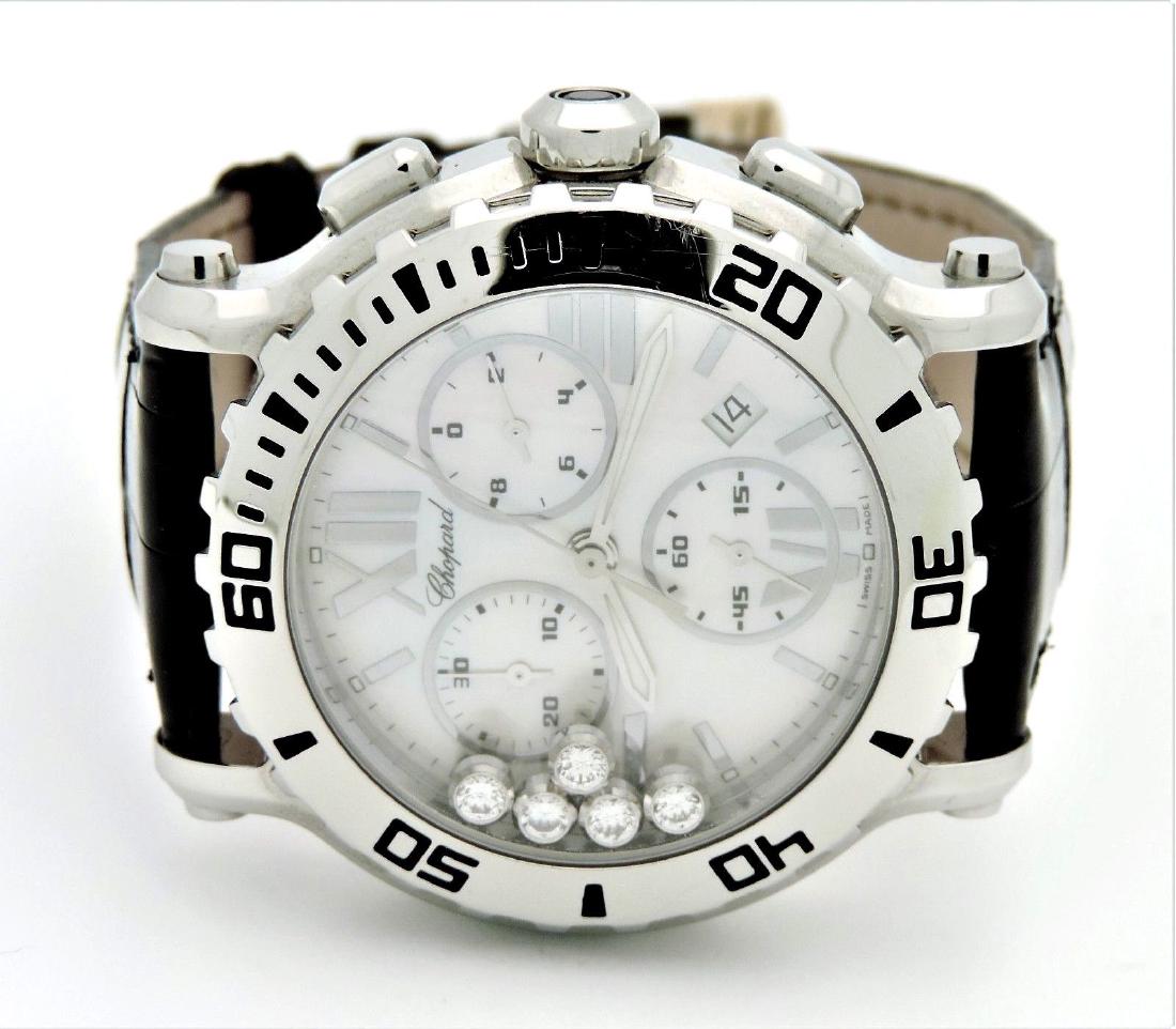 Chopard Happy Sport Chrono Black Alligtor Strap: Chopard Happy Sport. 42mm Quartz Movement, Stainless Steel and Black Alligator Strap. Displays Hours, Minute, Second, Chronograph and Date. Has Floating Diamonds. Box and Papers.