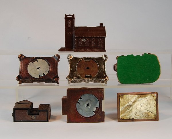 Lot of 7 White Metal building banks - 2
