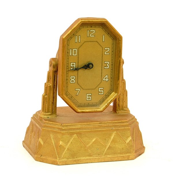 Deco Clock bank: Lead & Steel. 5 1/8 in. tall.