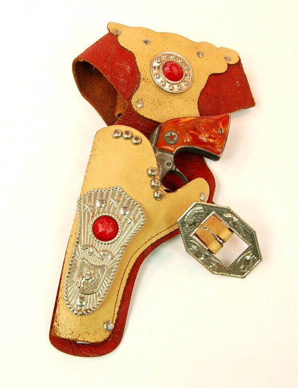 "Western" cap piston in Holster: Hubley 9 1/2 in. long