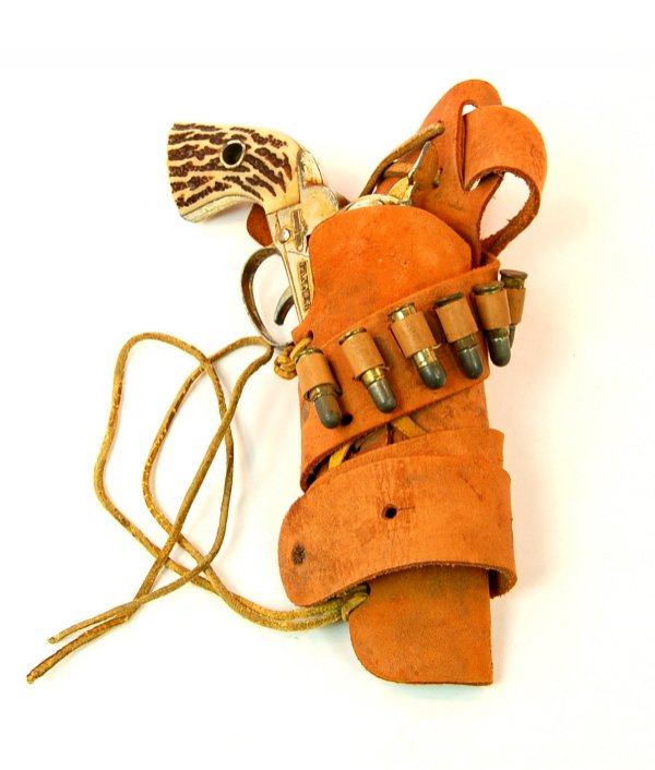 "Shootin Shell Fanner" cap pistol in Holster: Mattel (?) 9 1/2 in. long