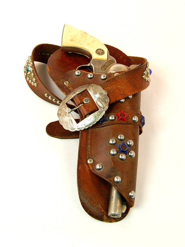 "Cowboy" cap pistol in Holster: Hubley 12 1/2 in. long