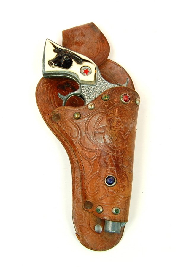 "Texan Jr." cap pistol with Holster: Hubley 9 1/2 in. long.