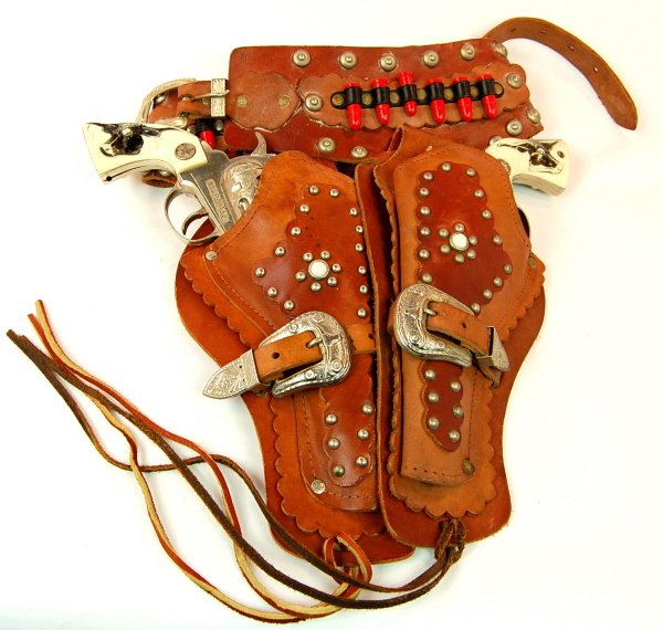Double Holster with 2 "Marshall" cap pistols: Hubley 10 1/2 in. long