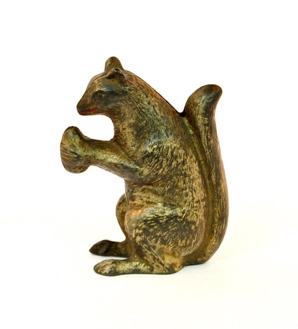 Squirrel with Nut bank: Cast iron. 4 1/8 in. tall.