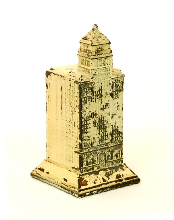 "Strauss National Bank" building bank: Lead. 5 1/8 in. tall.