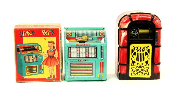 Lot of 2 musical mechanical banks: Plastic: "Ideola" Juke Box. Tin: Select-O-Matic Juke Box (with Box).