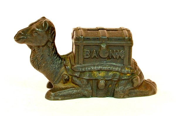 Kneeling Camel bank: Cast Iron. 2 1/2 in. tall.