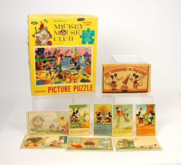 Lot of cards & puzzles, most are Disney: Mickey Mouse & Donald Duck puzzles (both with boxes). 4 Mickey Mouse Myers Bread cards. 4 Katzenjammer Kids postcards. French Mickey Mouse toy surprise in sealed envelope.
