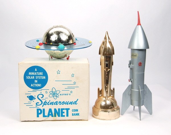 4 Space-themed mechanical banks + "Magic Safe".: White Metal. Two Rockets, Two Planet banks (1 in OB), & trick-drawer "The Magic Safe".