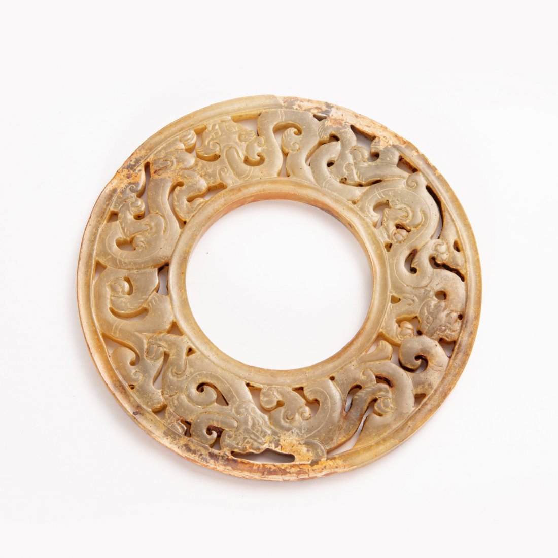 A Very Rare Ancient Chinese Chi Dragon Jade Bi Han: 31279 A Very Rare Ancient Chinese Chi Dragon Jade Bi Han Dynasty (BC202- AD220) 汉镂空雕螭龙纹玉璧 D:9.5cm,66.7g good condition 来源:&