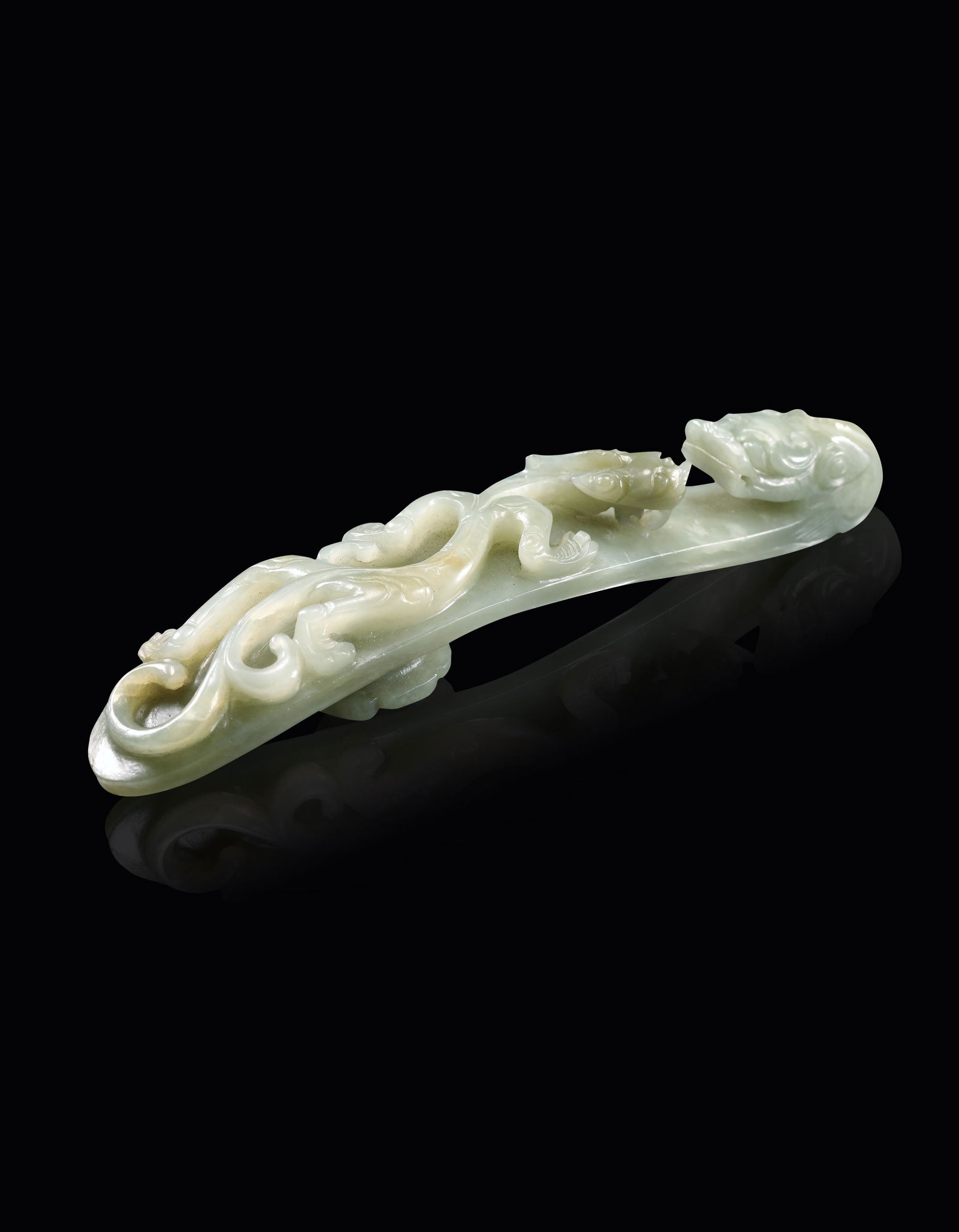 A Chinese White Jade Dragon Hook Qing (1 of 5)