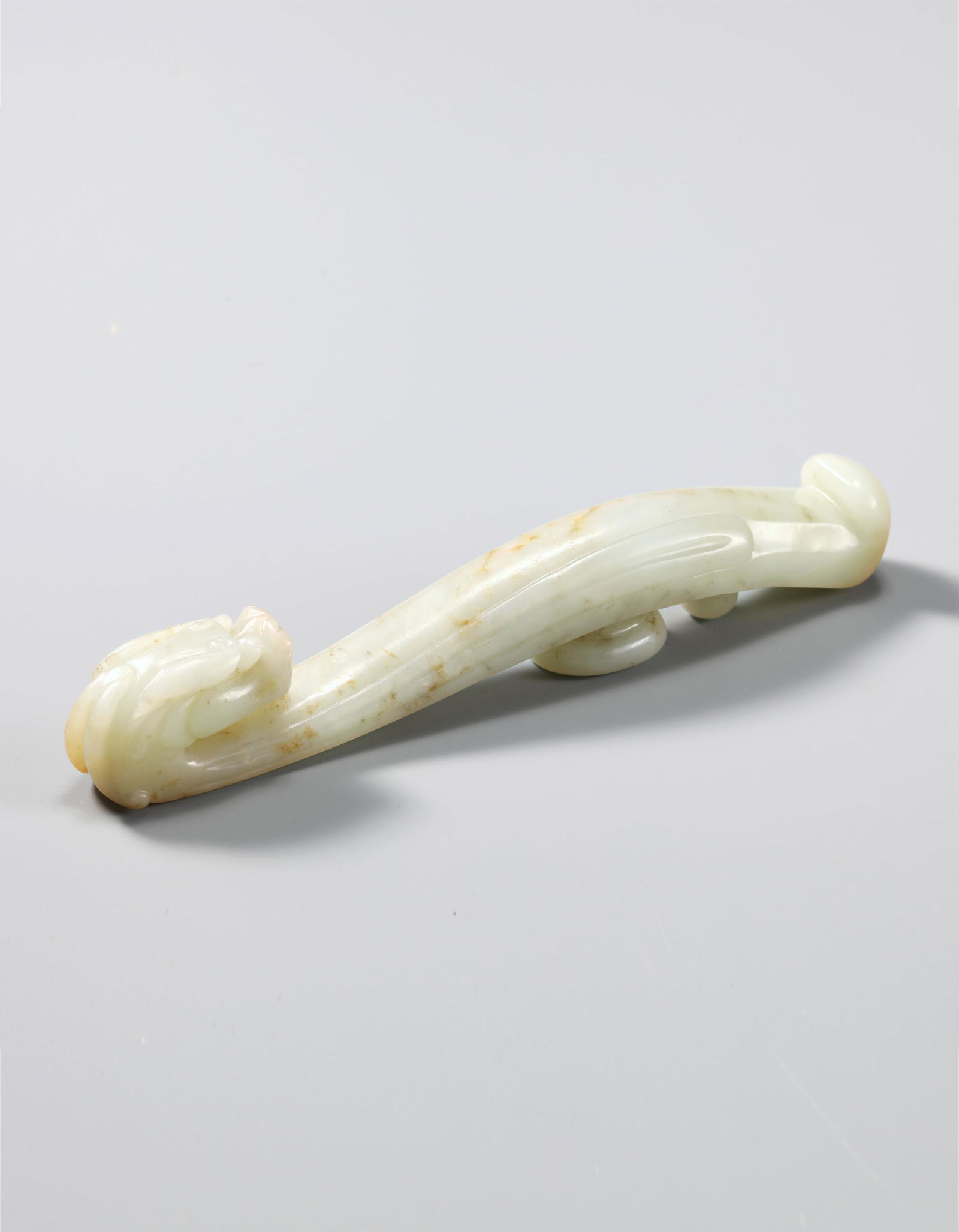 A Chinese White Jade Dragon Hook Qing (1 of 5)