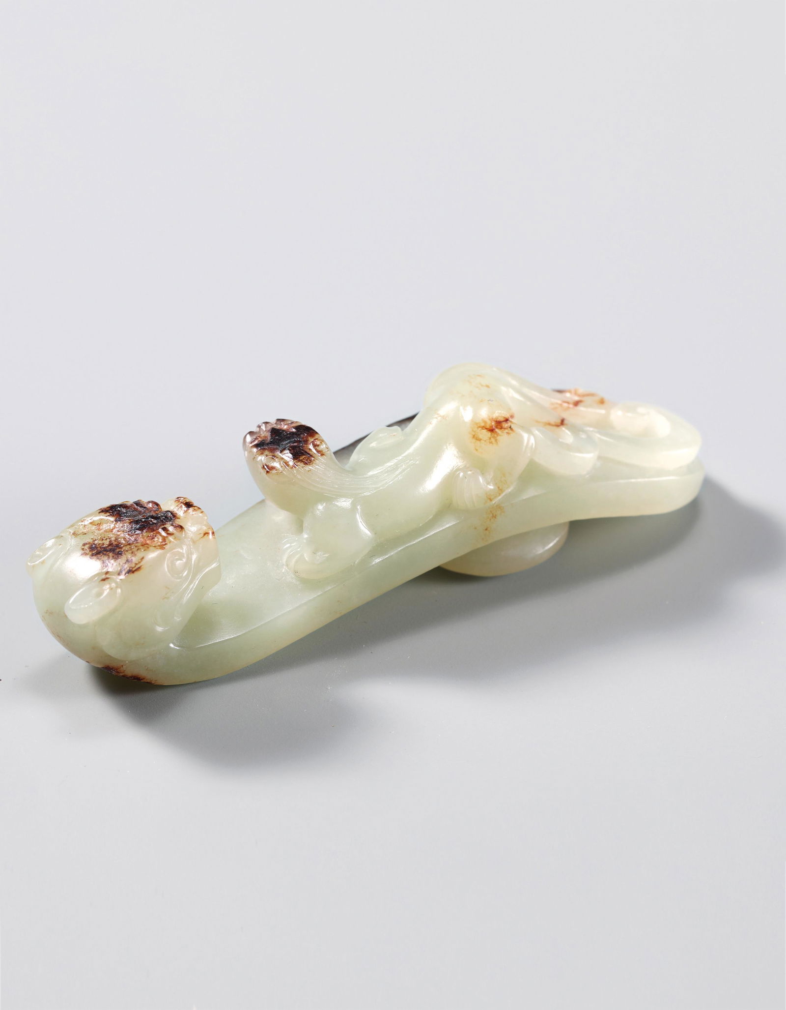 A Chinese White Jade Dragon Hook Qing (1 of 7)