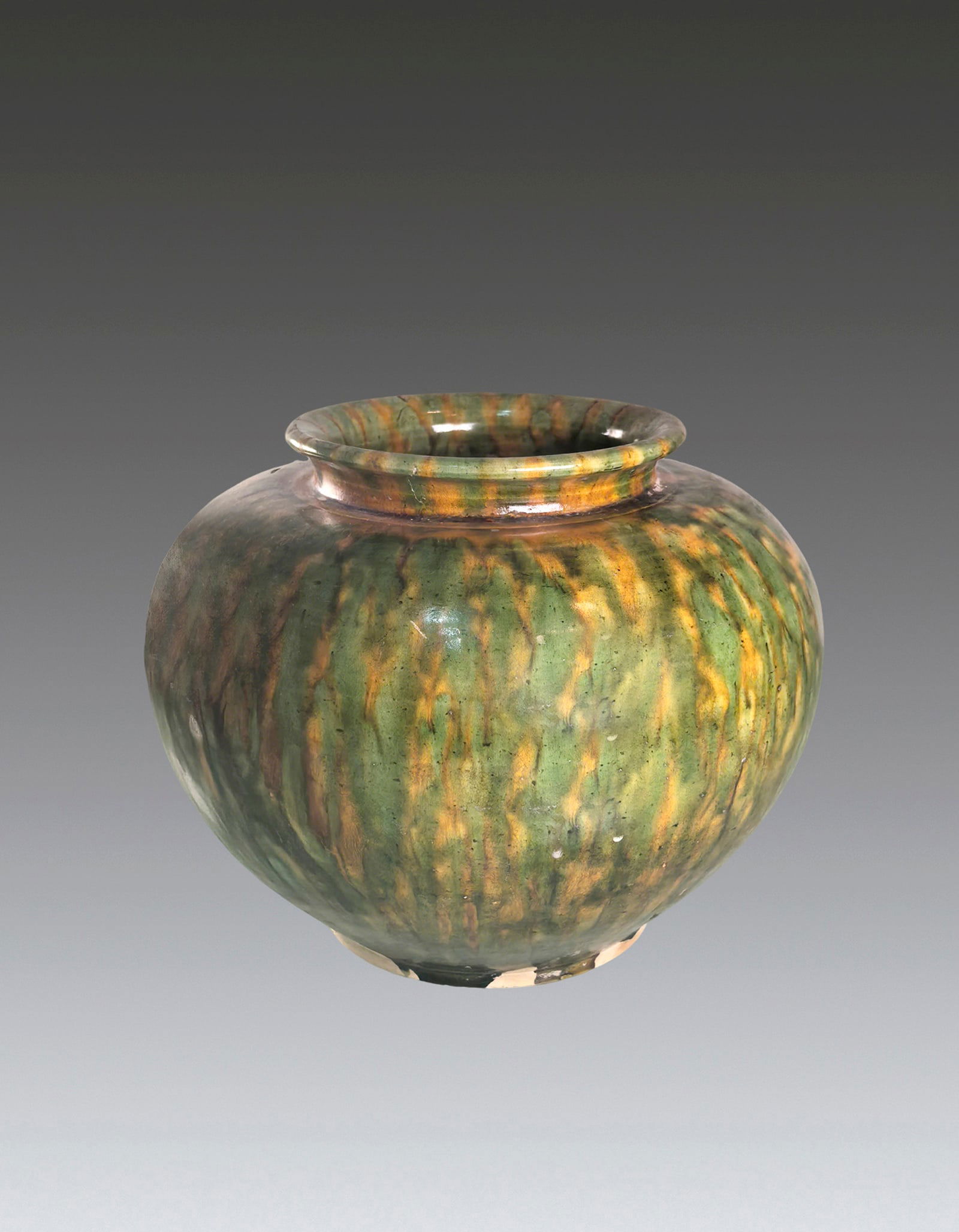 A Chinese Sancai Glazed Potrry Jar Tang Dynasty 618-907 (1 of 6)