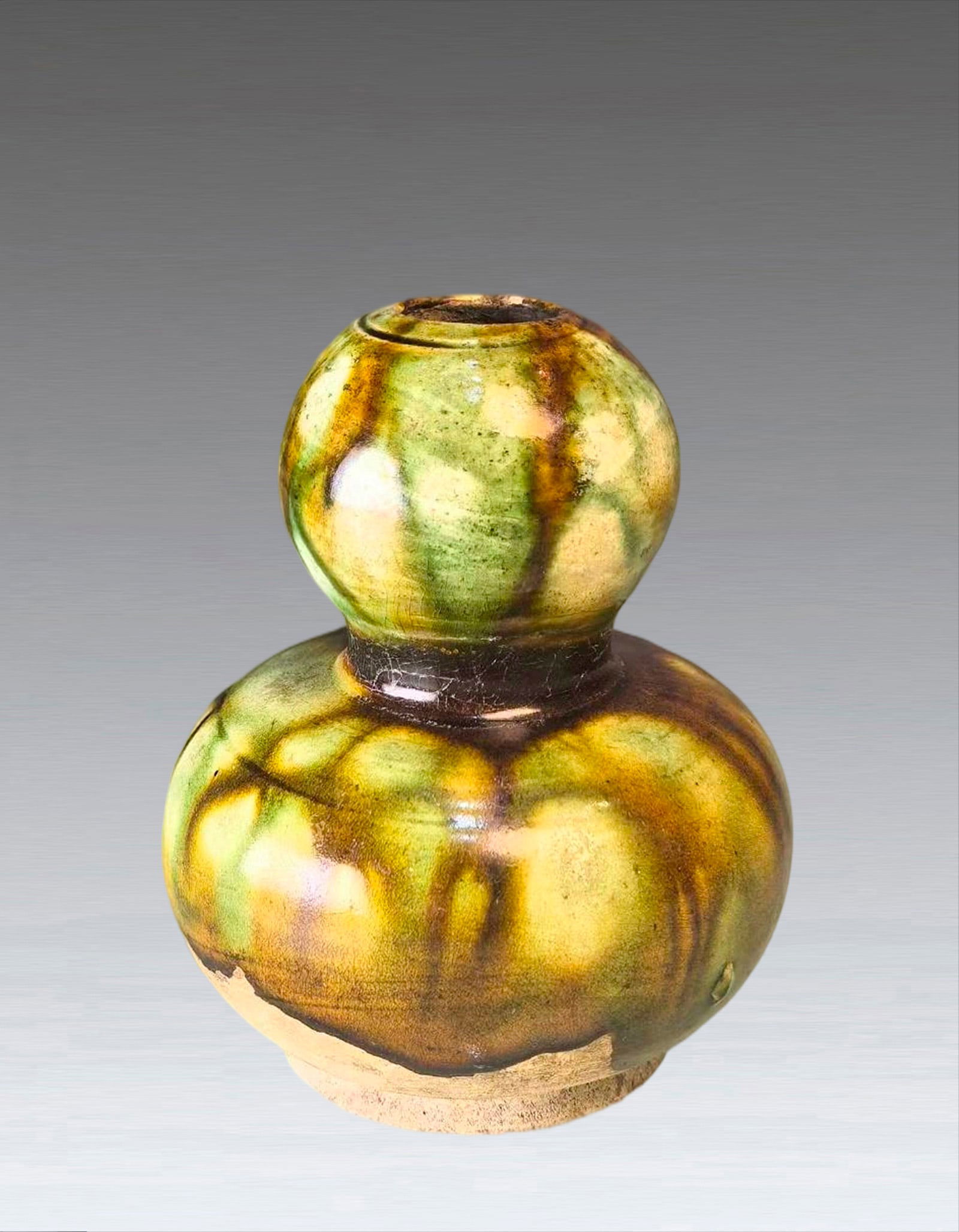 A Chinese Sancai Glazed Hulu Vase Tang Dynasty AD618-907 (1 of 4)