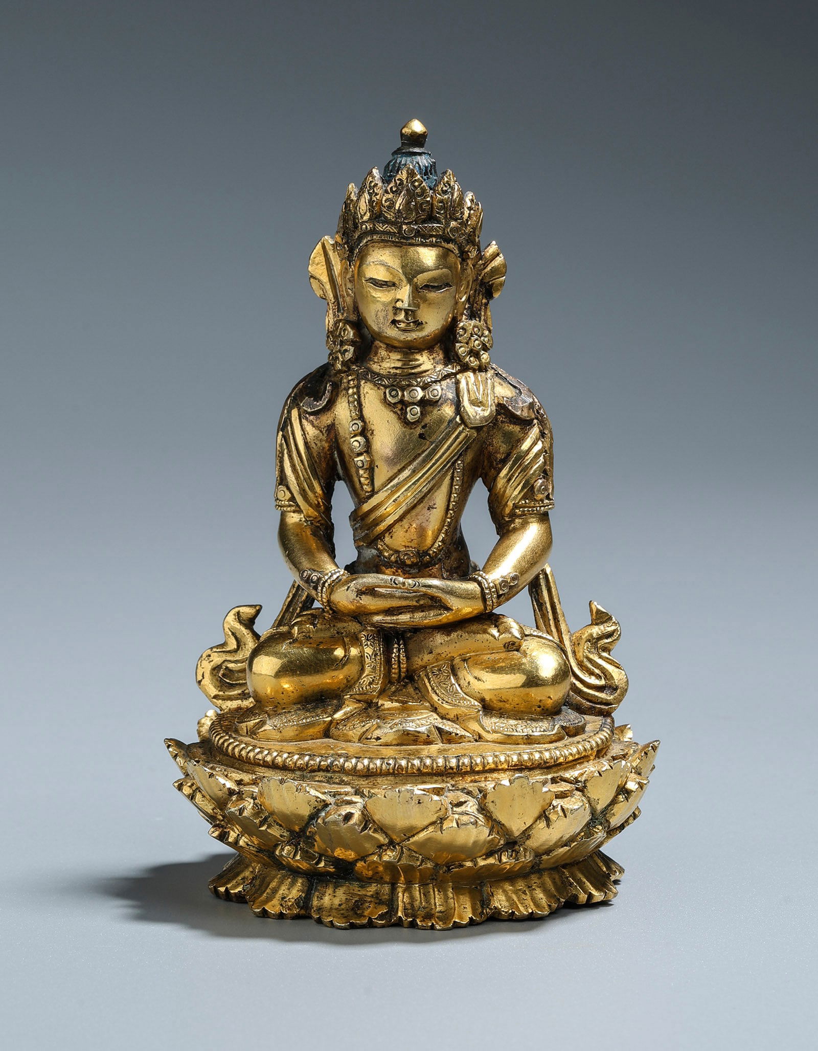 A Gilt Bronze Figure of Amitayus Qing Dynasty Kangxi Period 1661-1722 (1 of 8)