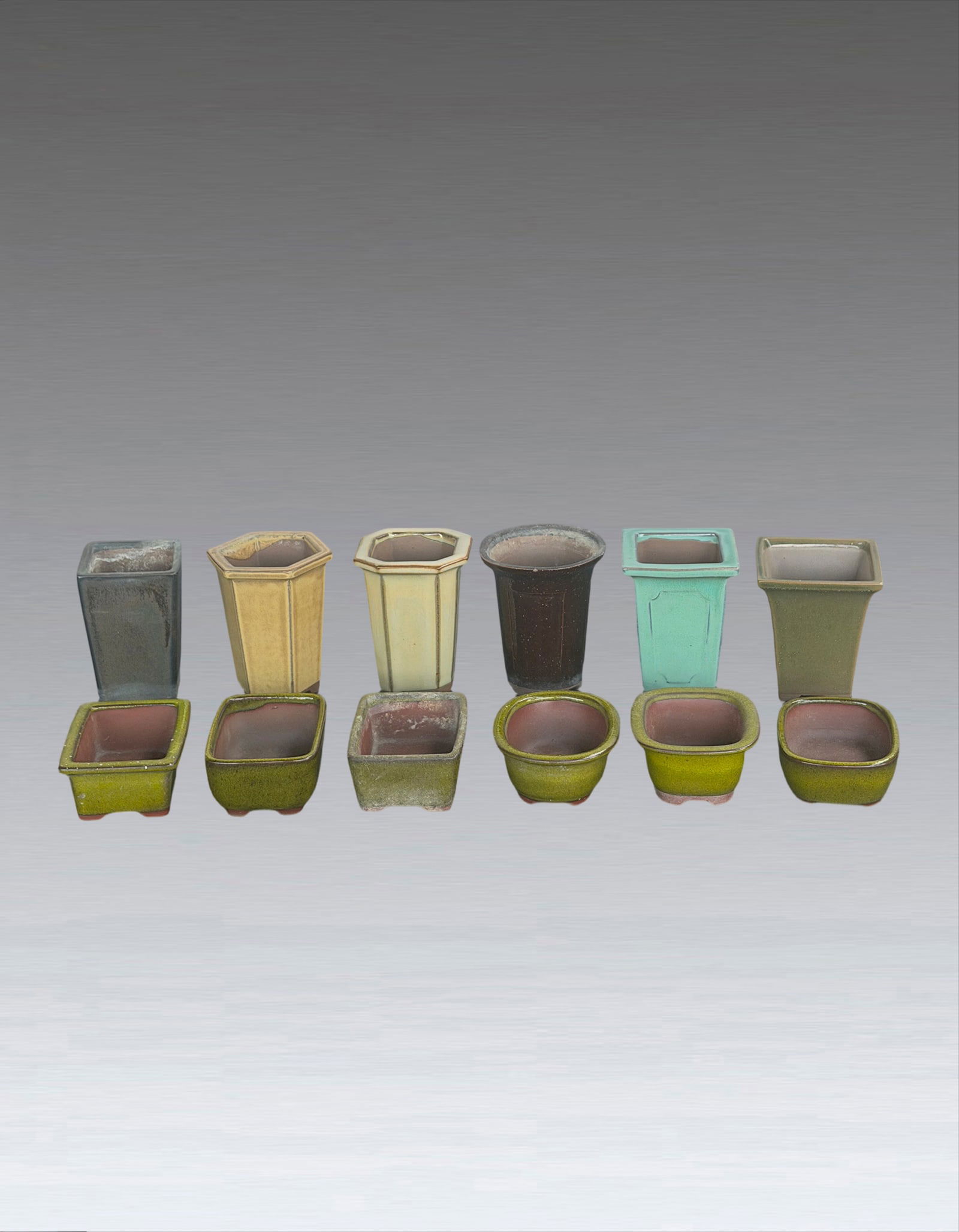 A Group of Clay Flower Pot: 251242 紫砂均釉花盆一组十二件 A Group of Clay Flower Pot USD200-500 H9.5x7x7cm 来源:新加坡收ൡ