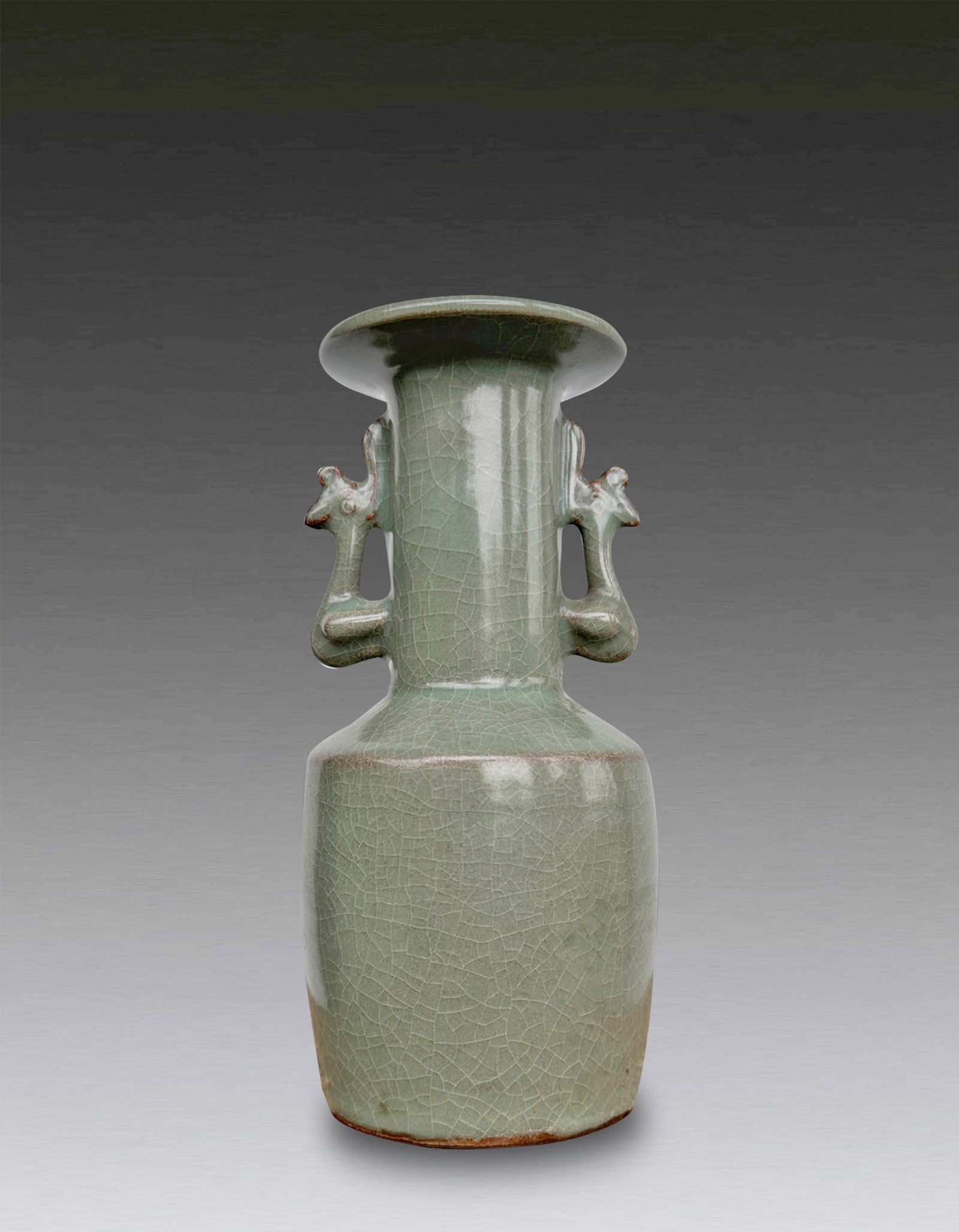 A Chinese Celadon Phoenix Ear Vase Southern Song Dynasty 1127-1279: 261044 南宋龙泉窑青瓷凤耳瓶1127-1279 A Chinese Celadon Phoenix Ear Vase Southern Song Dynasty 1127-1279 USD10000-20000 H18cm 器形