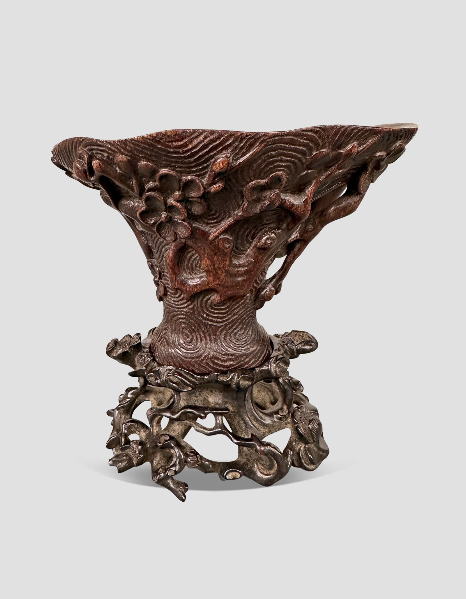 An Agarwood Blossom Horn Cup with Zitan Wood Stand Qing Dynasty 1644-1912: 261061 清沉香梅花角杯紫檀木底座1644-1912 An Agarwood Blossom Horn Cup with Zitan Wood Stand Qing Dynasty 1644-1912 USD4000-7000 
