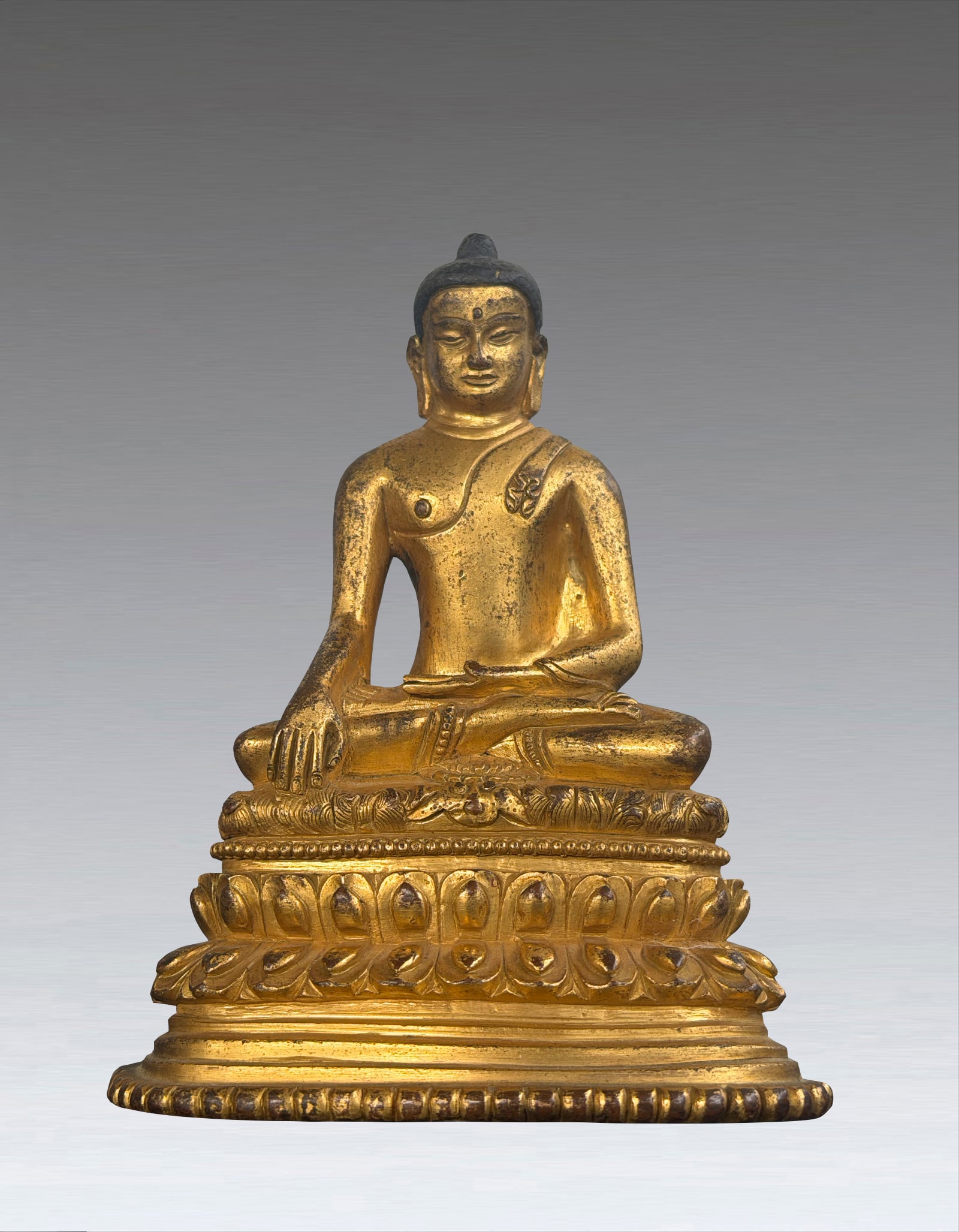A Tibetan Bronze Lama Figure Inlaid with Silver 15?C16th Century (1 of 7)