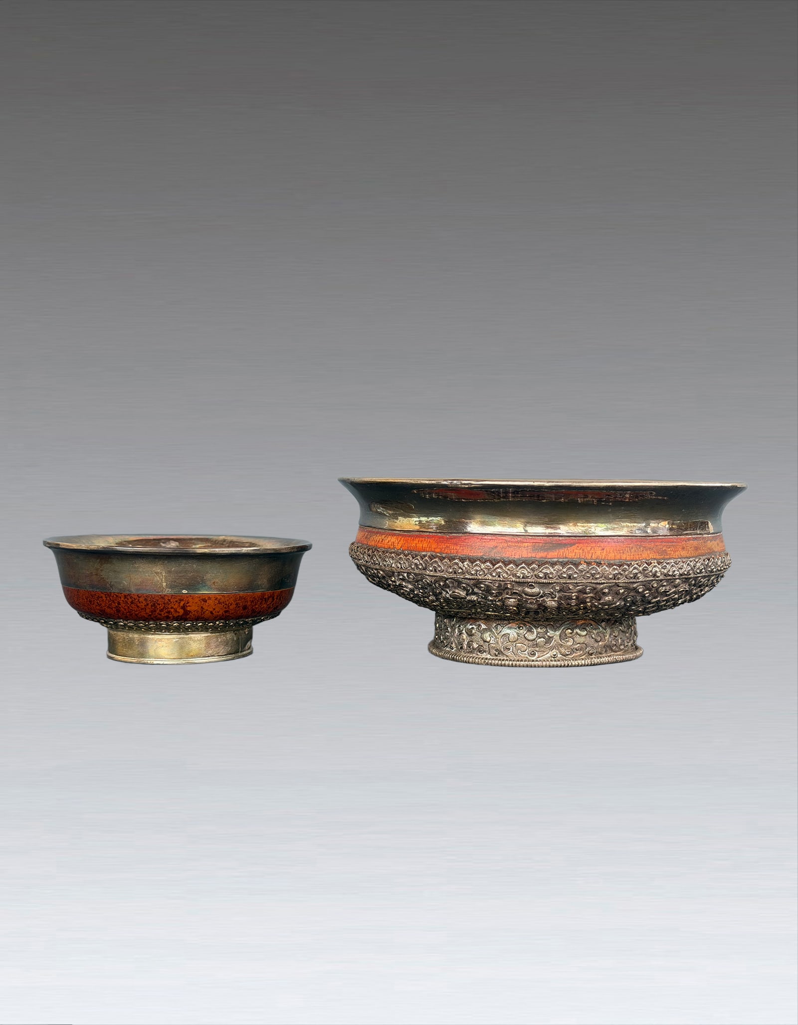 Pair of Tibat Bowl Qing Dynasty: 261186 清藏传仪式供奉浮雕碗一对 Pair of Tibat Bowl Qing Dynasty USD600-900 D19cmx12.5cm 包浆沉稳古