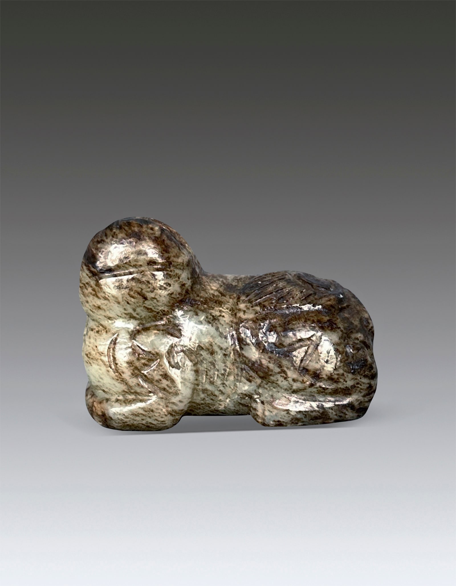 A Chinese White Jade Beast Ming Dynasty 1368-1644: 261193 明代和田白玉老提油瑞兽 1368-1644 A Chinese White Jade Beast Ming Dynasty 1368-1644 USD500-800 5x3.5cm 此件瑞&