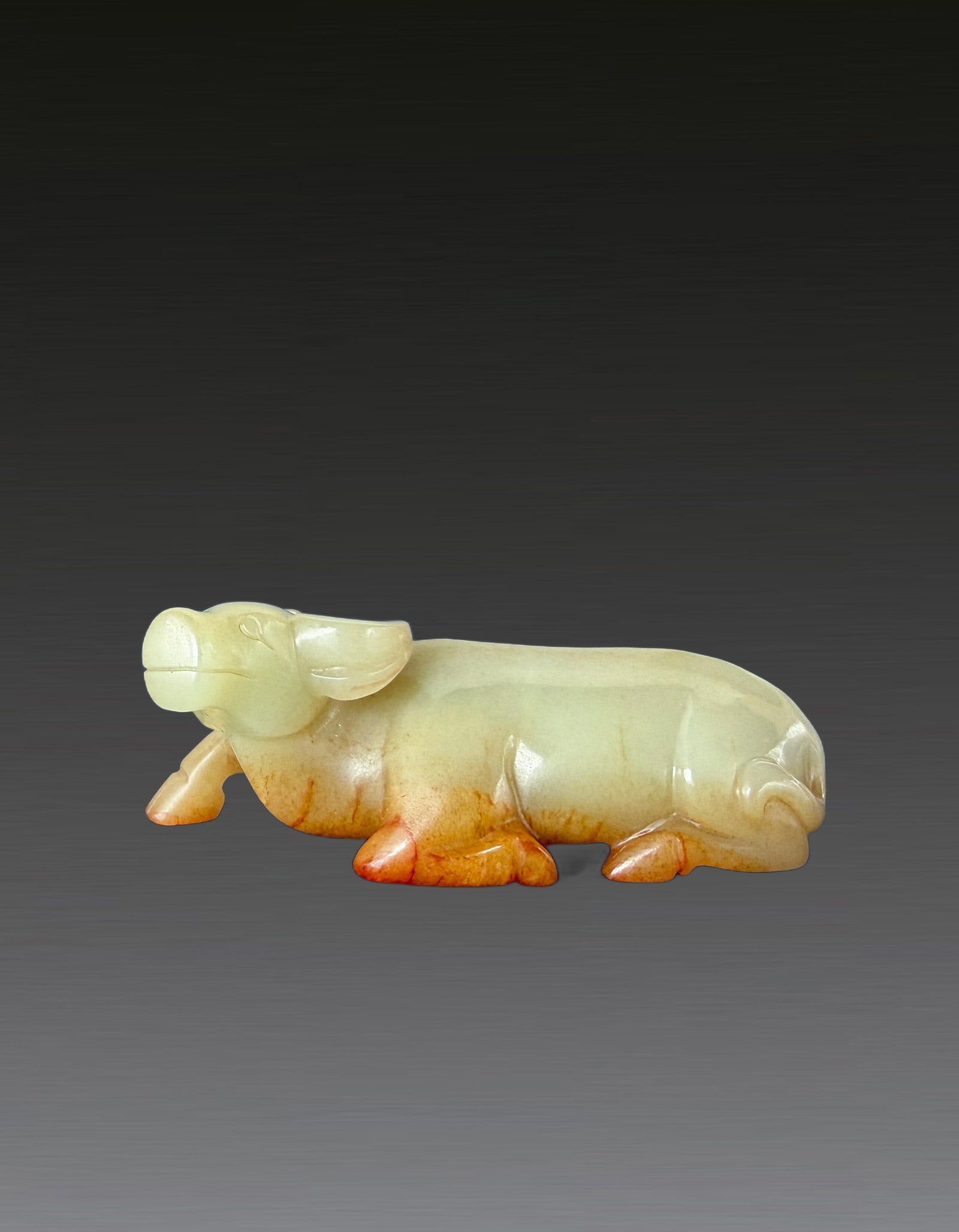 A Chinese White Jade Bull Qing Dynasty 1644-1912: 261199 清和田白玉籽料水牛雕件 1644-1912 A Chinese White Jade Bull Qing Dynasty 1644-1912 USD1000-2000 L9.5cm，167.2g 优