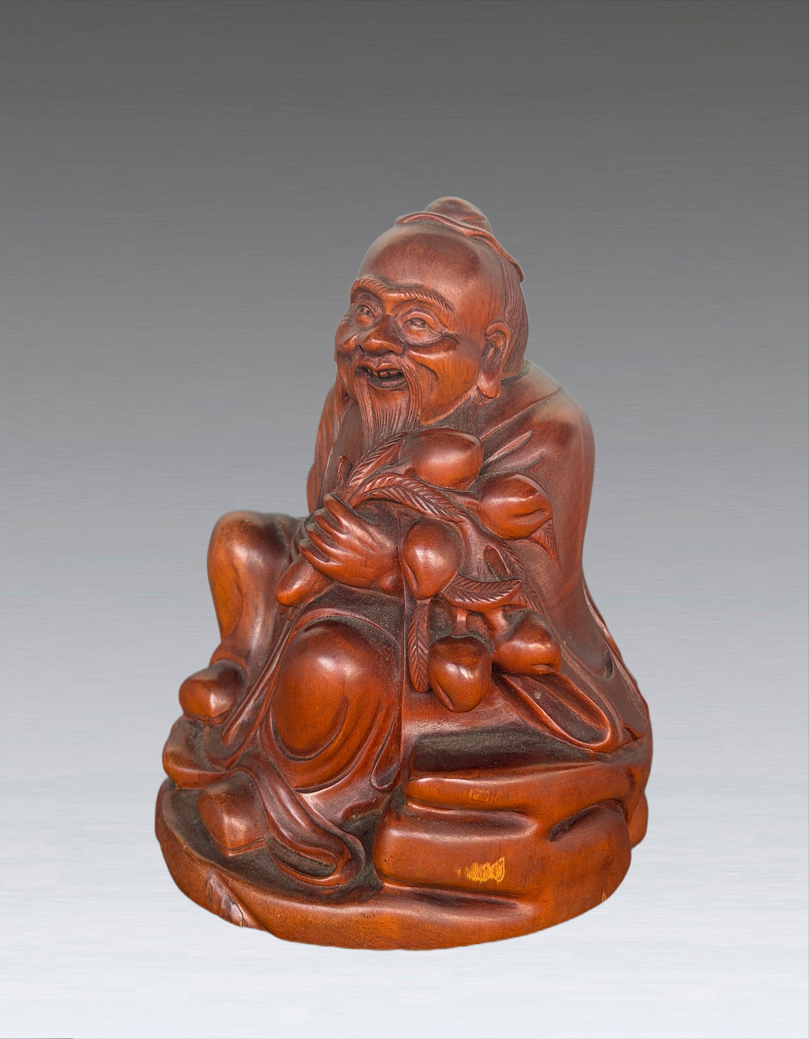A Chinese Boxwood Figure republic of China: 261205 民国黄杨木东方朔偷桃摆件 A Chinese Boxwood Figure republic of China USD300-500 H13cm 取材细腻