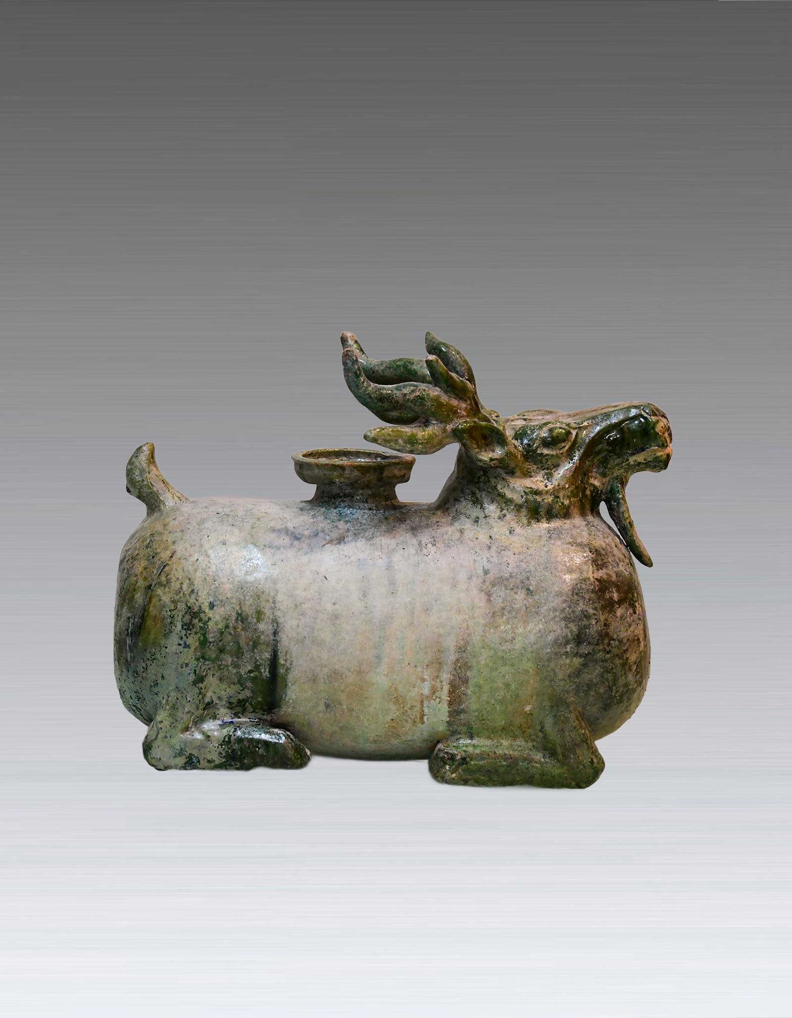 A Chinese Green Glazed Dear Shaped Zun Han Dynasty (1 of 5)