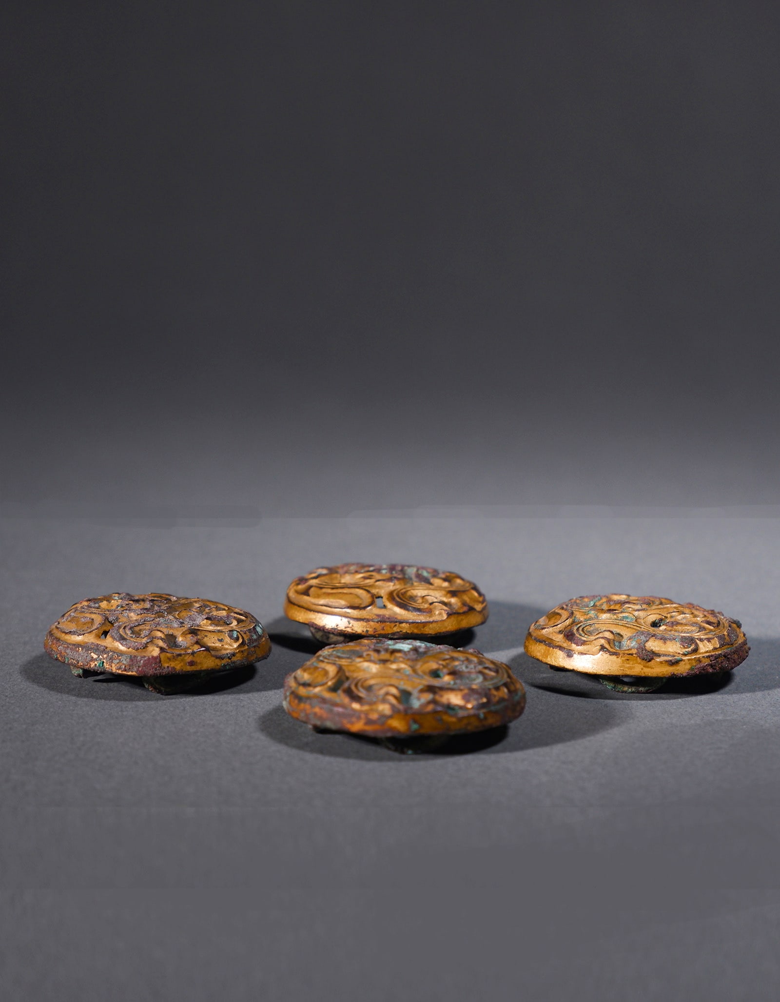 Set of Chinese Gilt Bronze Dragon Patterned Pendants Han Dynasty 206BC?CAD 220: 271145 汉代铜鎏金龙纹佩饰一套四件 BC202-AD220 Set of Chinese Gilt Bronze Dragon Patterned Pendants Han Dynasty 206BC–