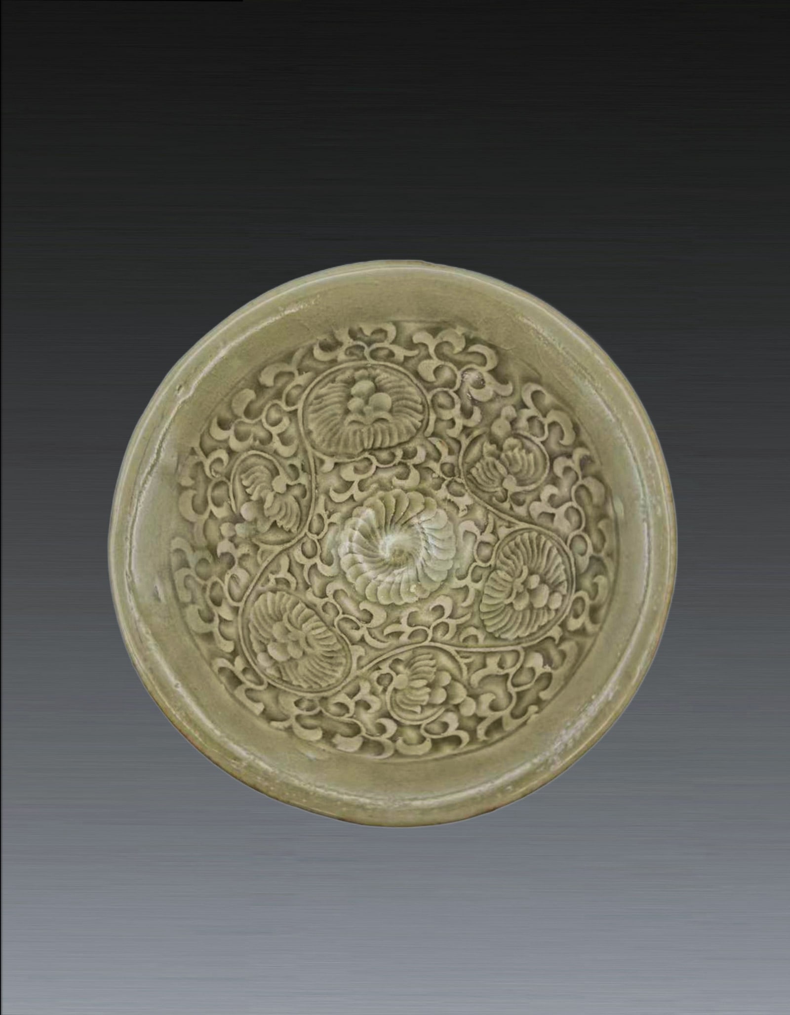 A Chinese Yaozhou Flower Bowl Song Dynasty: 271197 宋代耀州窑缠枝花卉纹盏 960-1279 A Chinese Yaozhou Flower Bowl Song Dynasty 来源：新加坡%