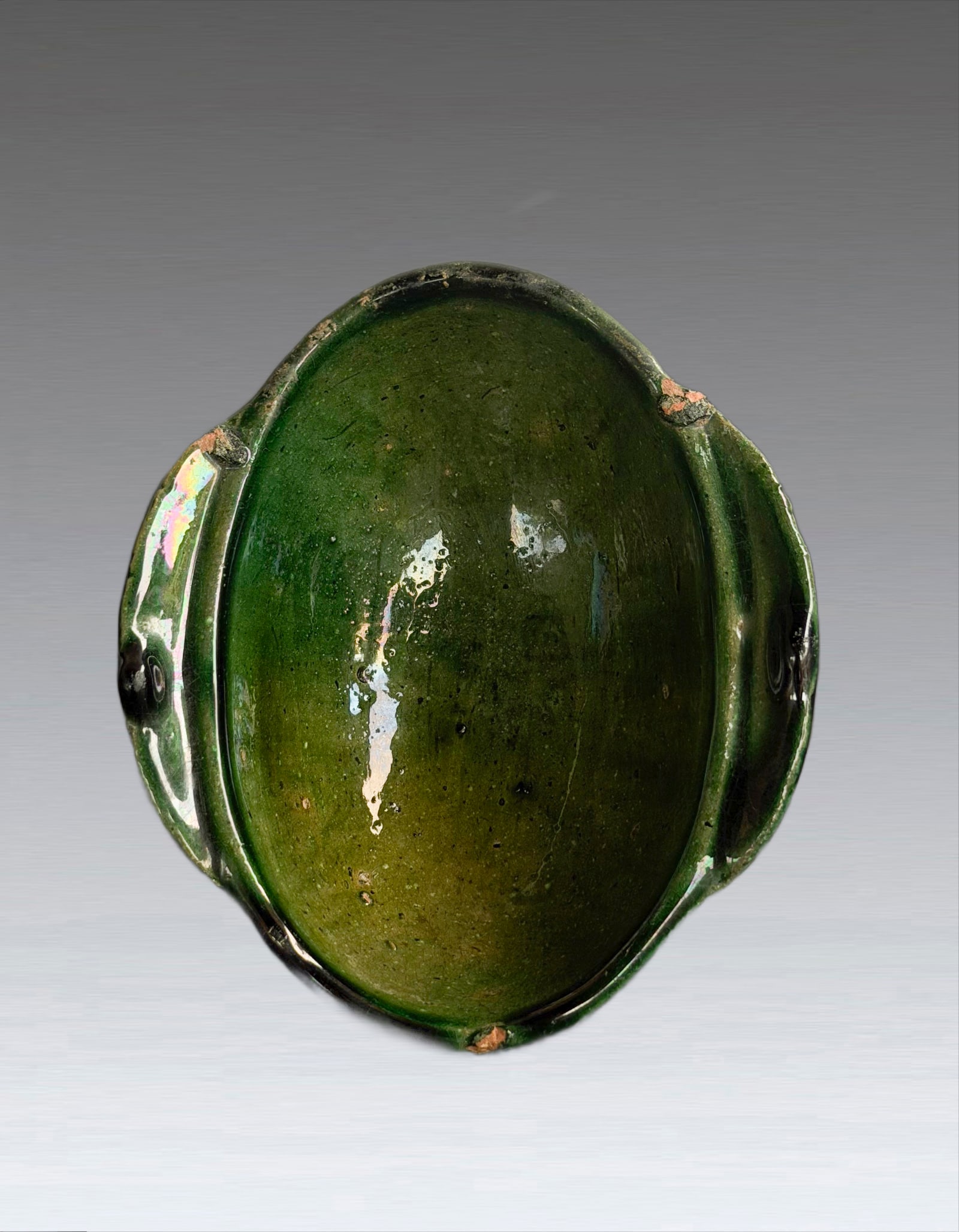A Chinese Green Glazed Cup Han Dynasty: 271200 汉代绿釉羽觞杯 A Chinese Green Glazed Cup Han Dynasty 来源：日本收藏家旧藏 USD300-500 L10.5