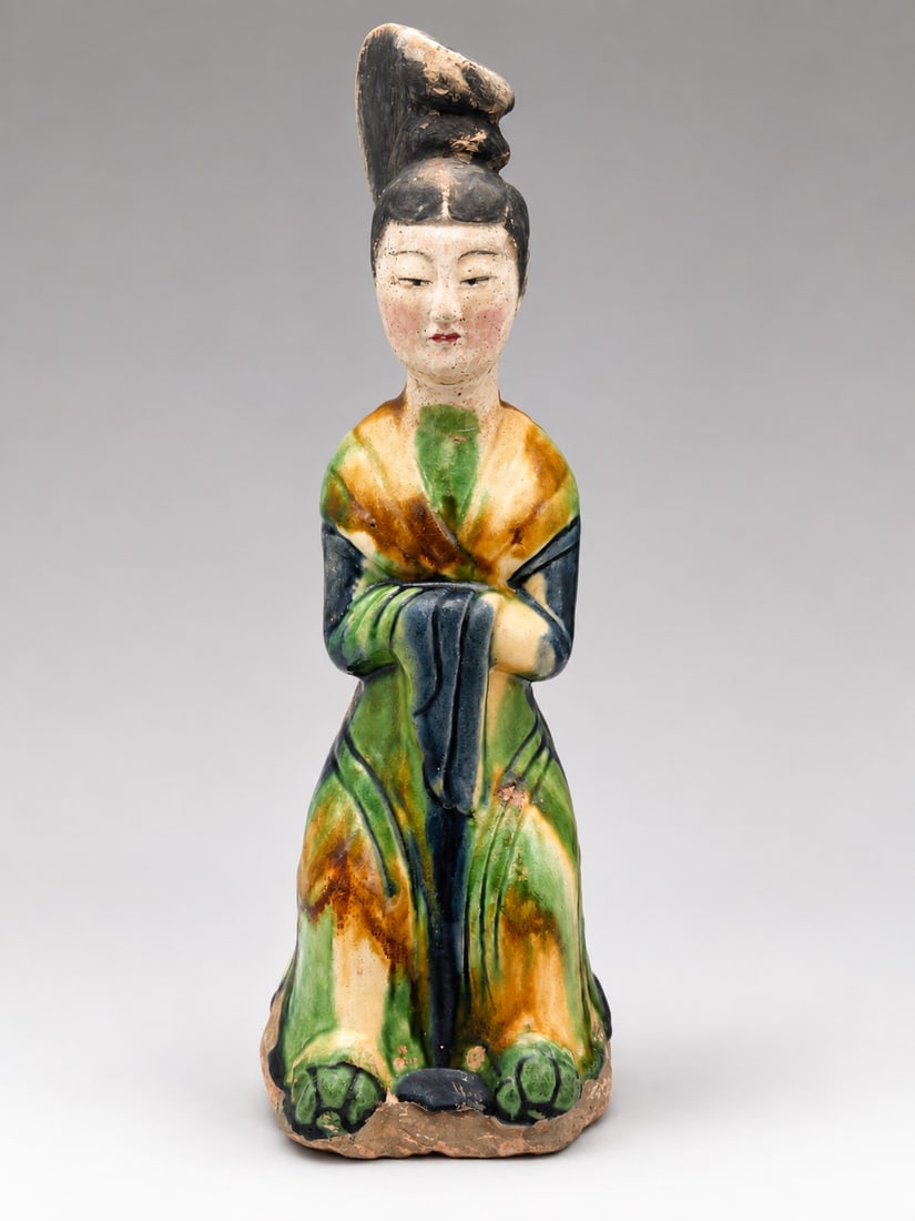 A Chinese Sancai Lady Tan Dynasty: 271204 唐三彩仕女座俑 A Chinese Sancai Lady Tan Dynasty 来源：70年代美国收藏家旧藏 USD