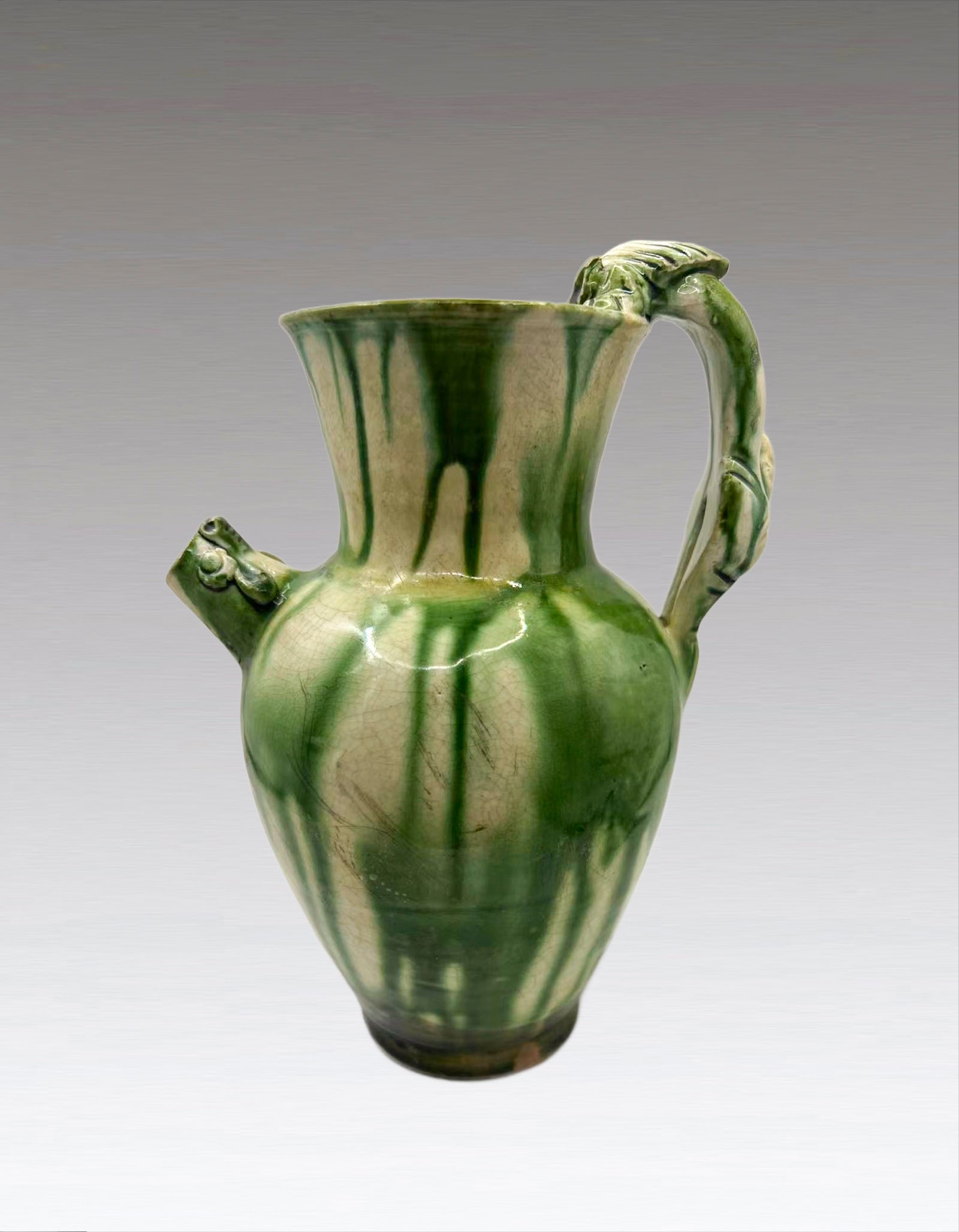 A Chinese Sancai Green Glazed Teapot Tang Dynasty (1 of 9)