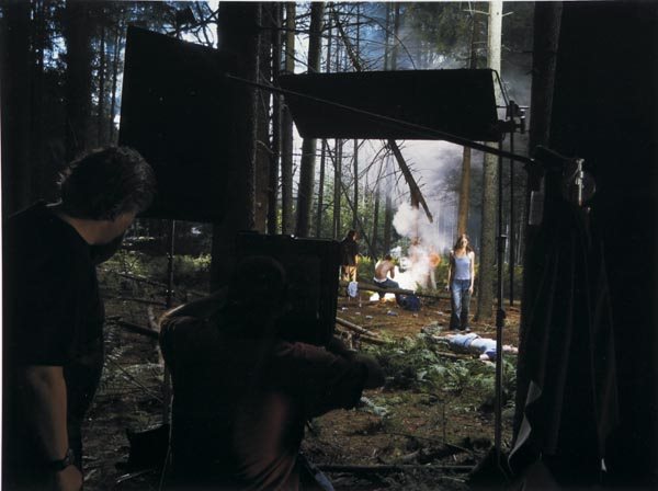 GREGORY CREWDSON b. 1962 Production Still (Fo: GREGORYCREWDSONb. 1962Production Still (Forest Gathering #3) "Beneath the Roses", 2003Digital chromogenic print.