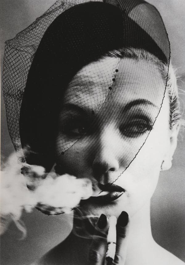 WILLIAM KLEIN 1928 Smoke and Veil (Vogue), Pa: WILLIAMKLEIN1928Smoke and Veil (Vogue), Paris, 1958Gelatin silver print, printed later. 14 ⅋