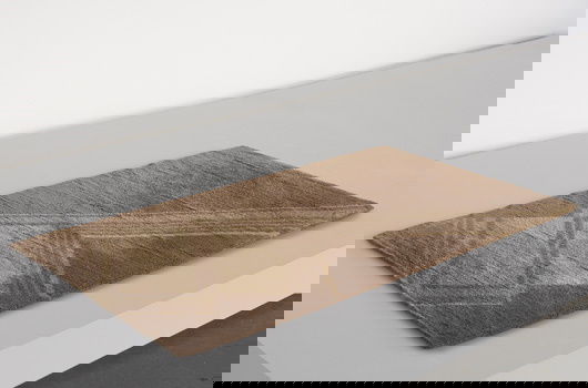 MARION DORN, 1899-1964: Rug, ca. 1930 Wool, bast fiber. Dimensions: 65 ½ x 36 ⅜ in. (166.4 x 92.4 cm) Manufactured by Wilton Royal Carpet Factory, UK. Signed in weave "DORN." Based on period photographs of simi