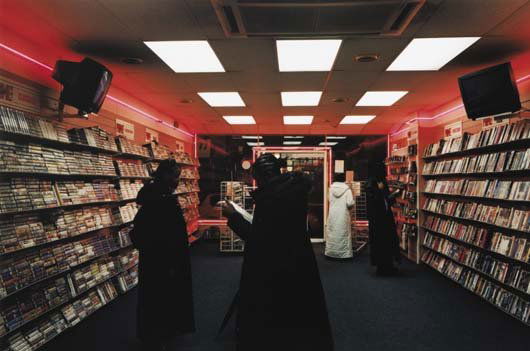 HANNAH STARKEY, b. 1971: Untitled-January 2000, 2001 C-print. 14 ½ x 22 ½ in. (36.8 x 57.2 cm). Signed "Hannah Starkey" on the reverse. This work is from an edition of 15. Provenance: Maureen Paley Interim Art,