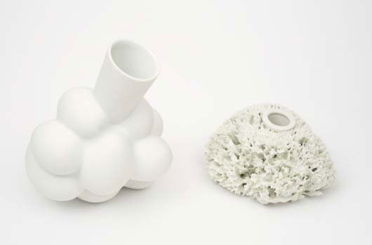 MARCEL WANDERS, b. 1963: Sponge" and "Egg" vases, 1997 Porcelain. Each produced by Droog Design. Each stamped "Wanders Wonders" (2). "Sponge": 2 ¼ in. (5.7 cm) high; "Egg": 5 ¾ in. (14.6 cm) high.