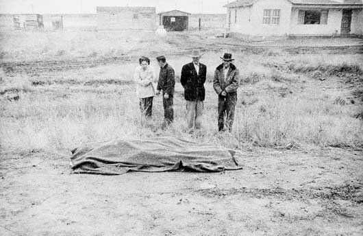 ROBERT FRANK, b. 1924: Between Winslow and Flagstaff U.S. 66, Arizona, 1956 Gelatin silver print, printed circa 1975. 8 x 12 ⅜ in. (20.3 x 31.4 cm). Signed, titled and dated in ink in the margin. PROPERTY SOLD TO BEN